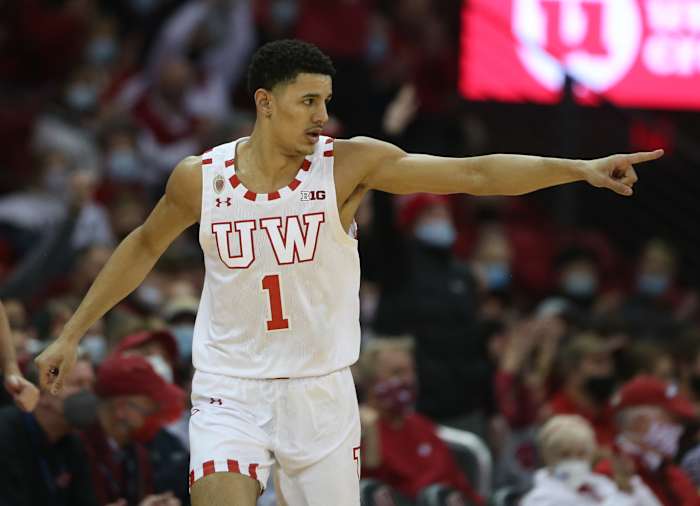 Wisconsin Badgers guard Johnny Davis (1) acknowledges an assist after completing a three-point basket during the game with the Iowa Hawkeyes during the first half at the Kohl Center.
